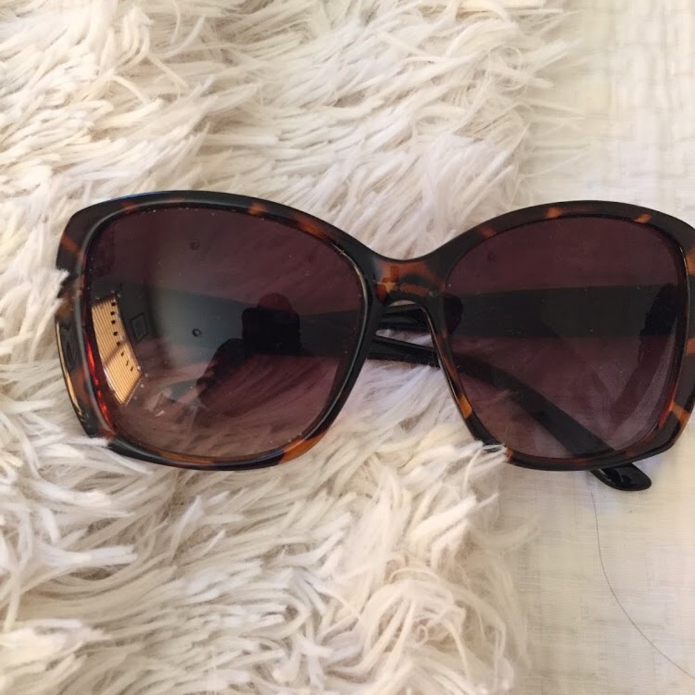 new condition sunglasses with a brown print